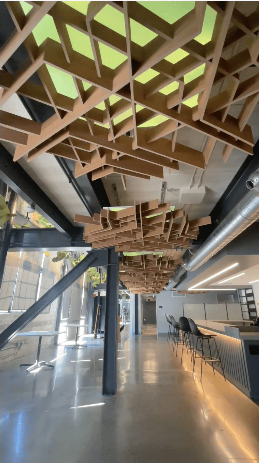 Color-changing backlit lattice ceiling in a corporate break room