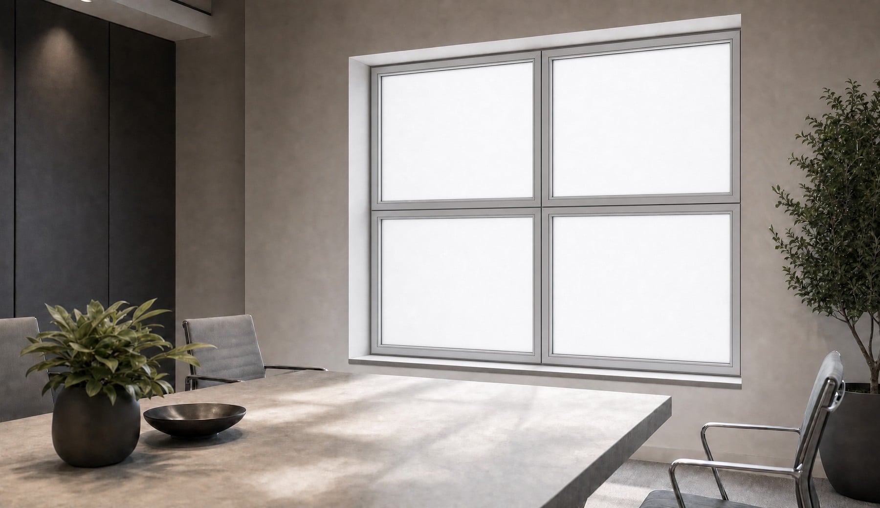 Four equal-size frosted ImageArt Glass units in a recessed wall opening glowing daylight white, creating a simulated window in a windowless meeting room
